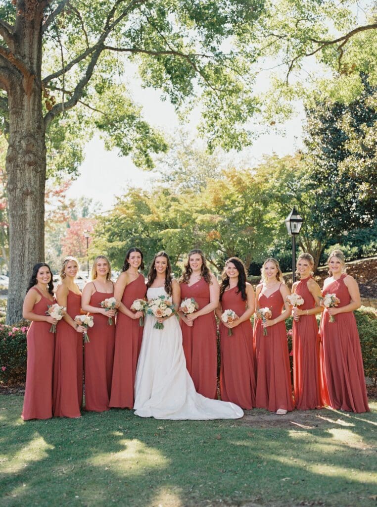 Bridesmaid's in fall dresses at Sugarloaf country Club Wedding