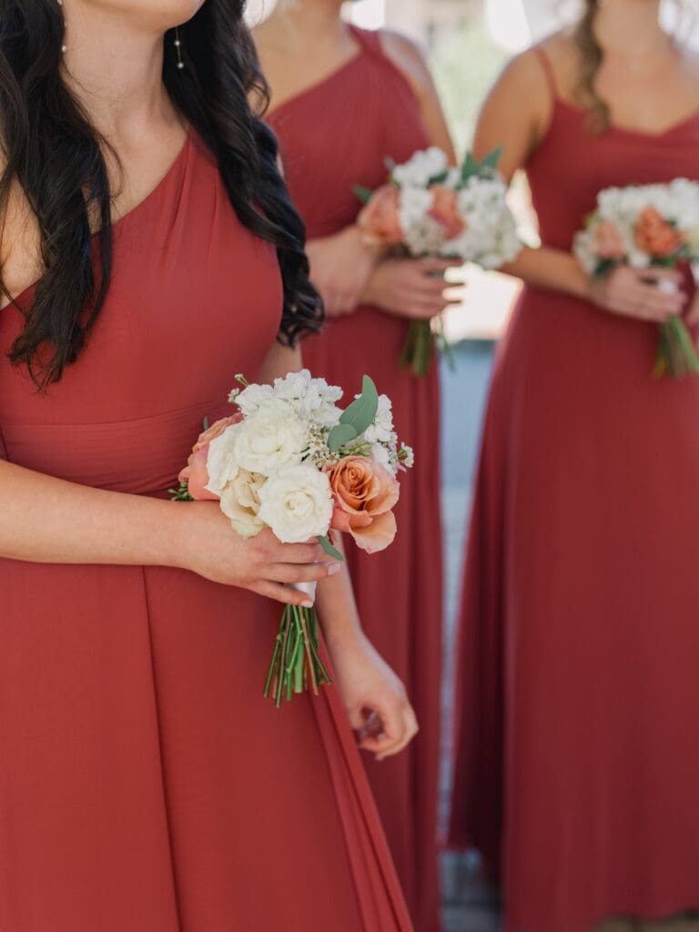 Close up of fall bridesmaids dresses at Sugarloaf Country Club
