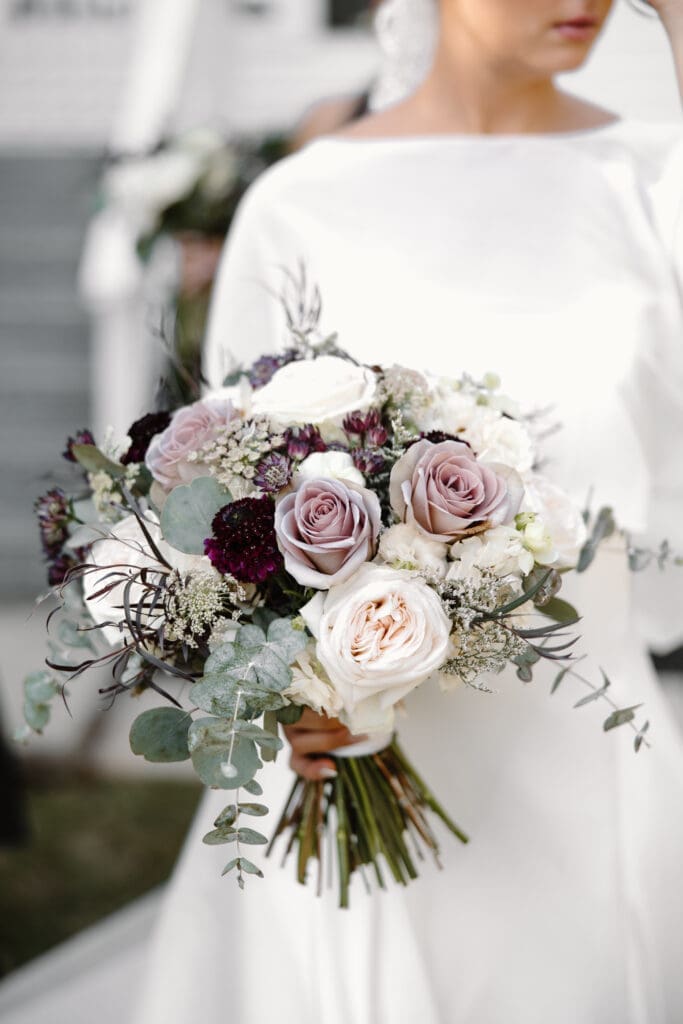 lose-up of Amnesia roses and scabiosa in luxury wedding floral design