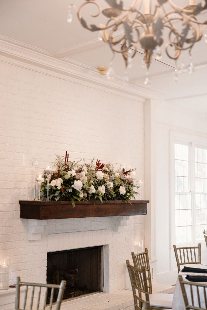 Luxury floral installations enhancing Payne-Corley House wedding reception space