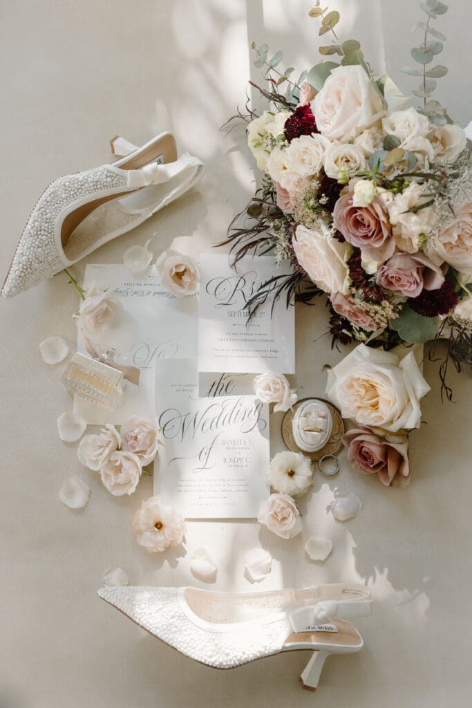 Luxury bridal bouquet with blush roses, Amnesia roses, ranunculus, and eucalyptus at Payne-Corley House wedding