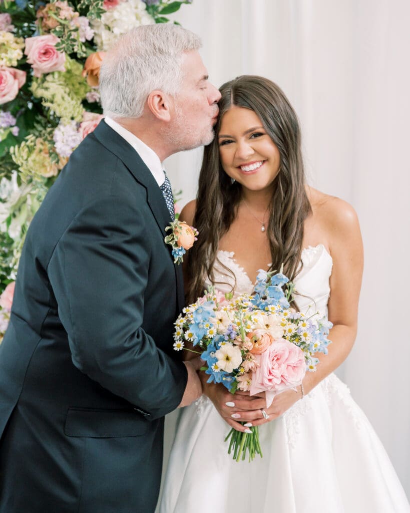 Father-Daughter moment for The Revere Venue colorful wedding