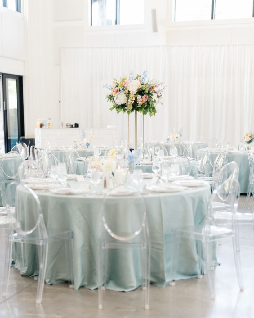 Colorful elevated centerpiece at The Revere Venue wedding