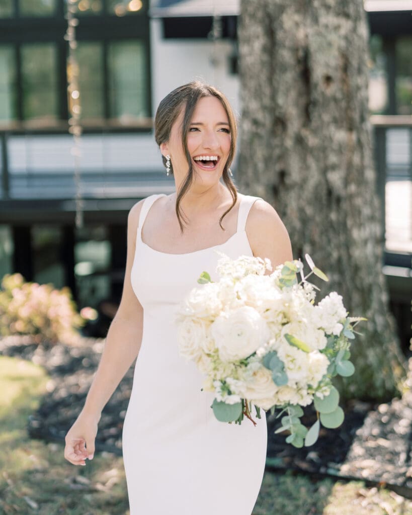 Luxury bridal bouquet of white garden roses and ranunculus designed by an Atlanta wedding florist
