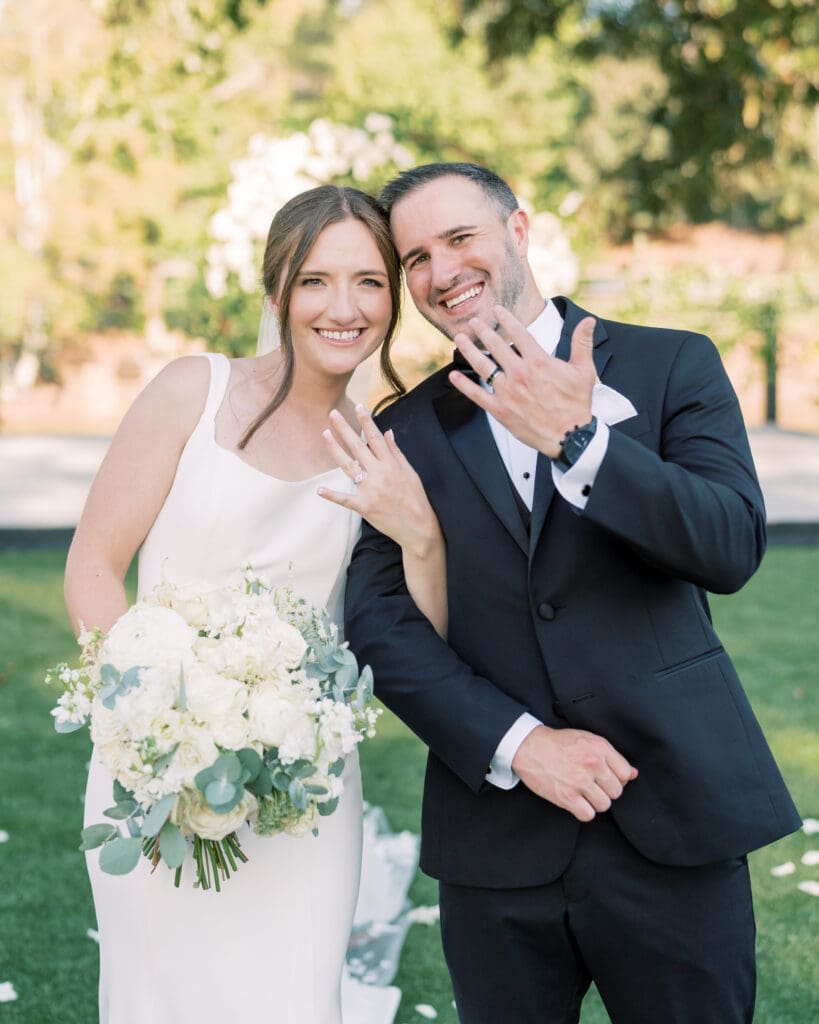 White wedding bouquet featuring garden roses, ranunculus, and eucalyptus for a luxury Atlanta wedding