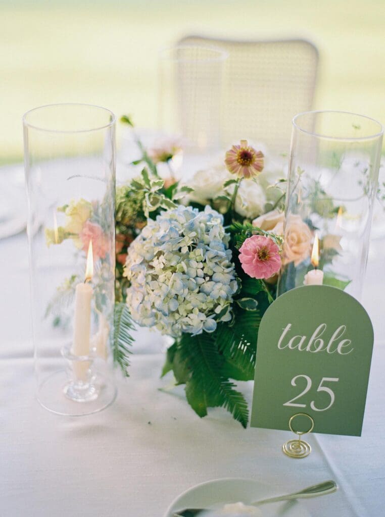 Garden inspired wedding centerpiece with hydrangea and candles at Greenfield Farms