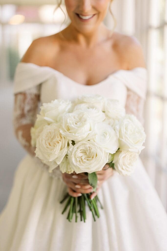 Classic white rose bridesmaid bouquets at elegant Atlanta wedding at TPC Sugarloaf